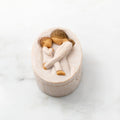 Willow Tree Tenderness Keepsake Box, 3.4" oval x 2.4" W x 1.5" D hand-painted resin box with removable lid. Lid has bas-relief carving of woman holding toddler, touching foreheads, inside of box has sentiment