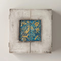 Willow Tree Starry Night Nativity, 8.5”h x 8”w x 2”d resin triptych with hinged doors, cream exterior with gold and blue details, doors open to 16”w with interior bas-relief Nativity scenes