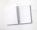Inside view: inside spread of notebook, showing lined text-weight pages