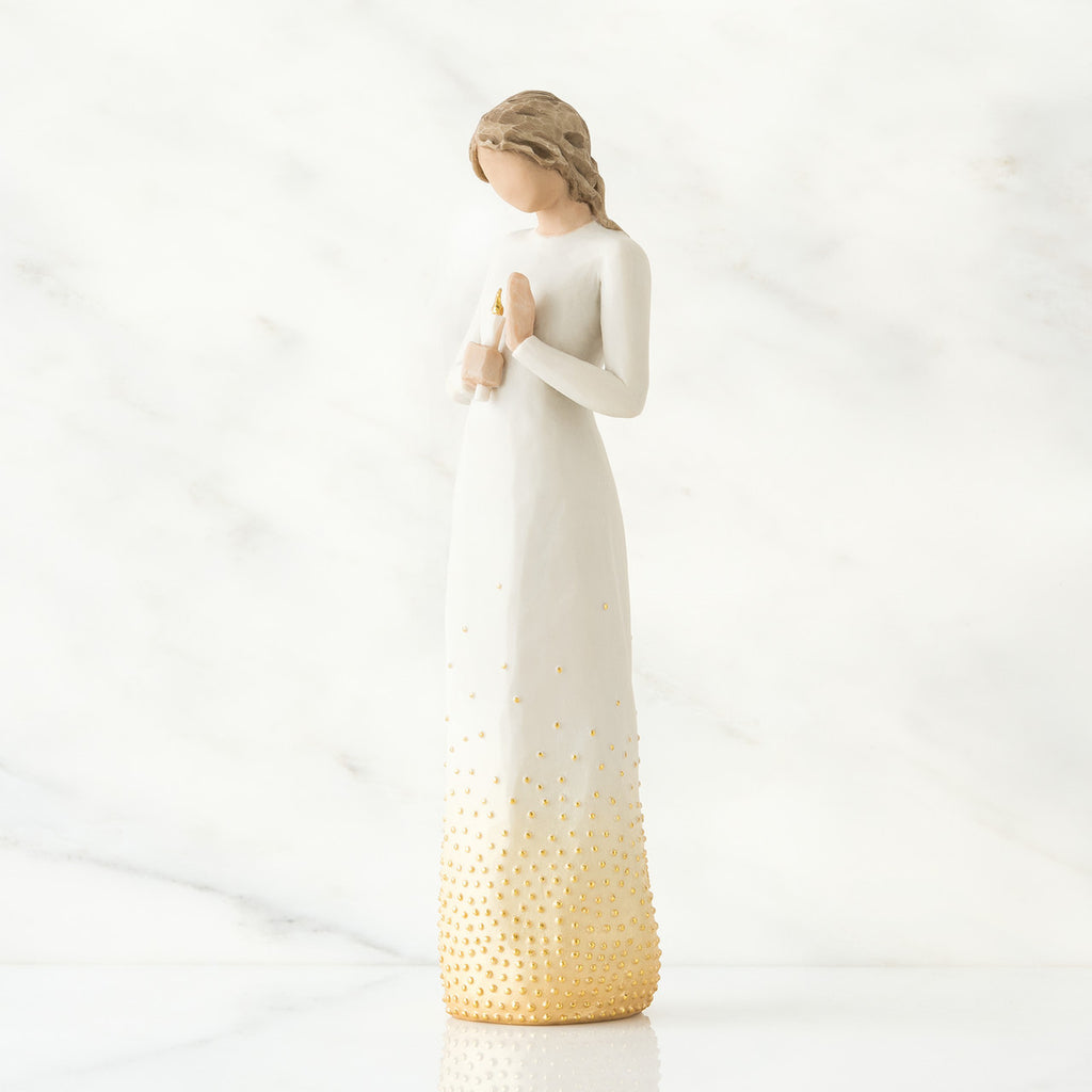 Brunette girl figurine in white dress holding arms up