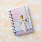 Willow Tree Remembrance Notebook, 6.5"w x 8.5"h, hard-cover, spiral-bound, 240 lined pages, front cover features Remembrance figure on background of purple-blue painting